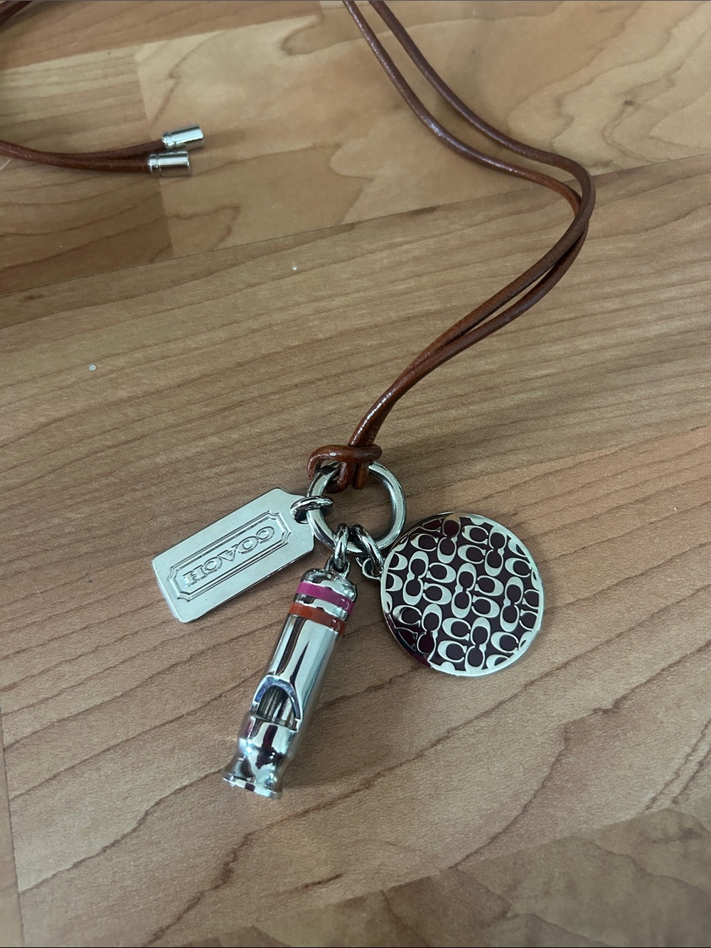 Coach Brown Leather Charm Necklace with Silver and Pink Accents - Picture 2 of 4